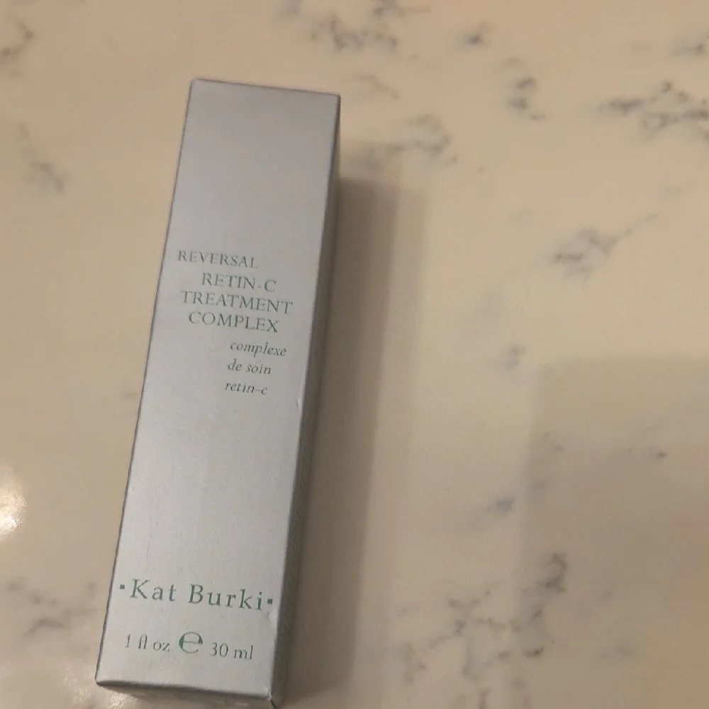 Kat Burki Silver Face Mask
